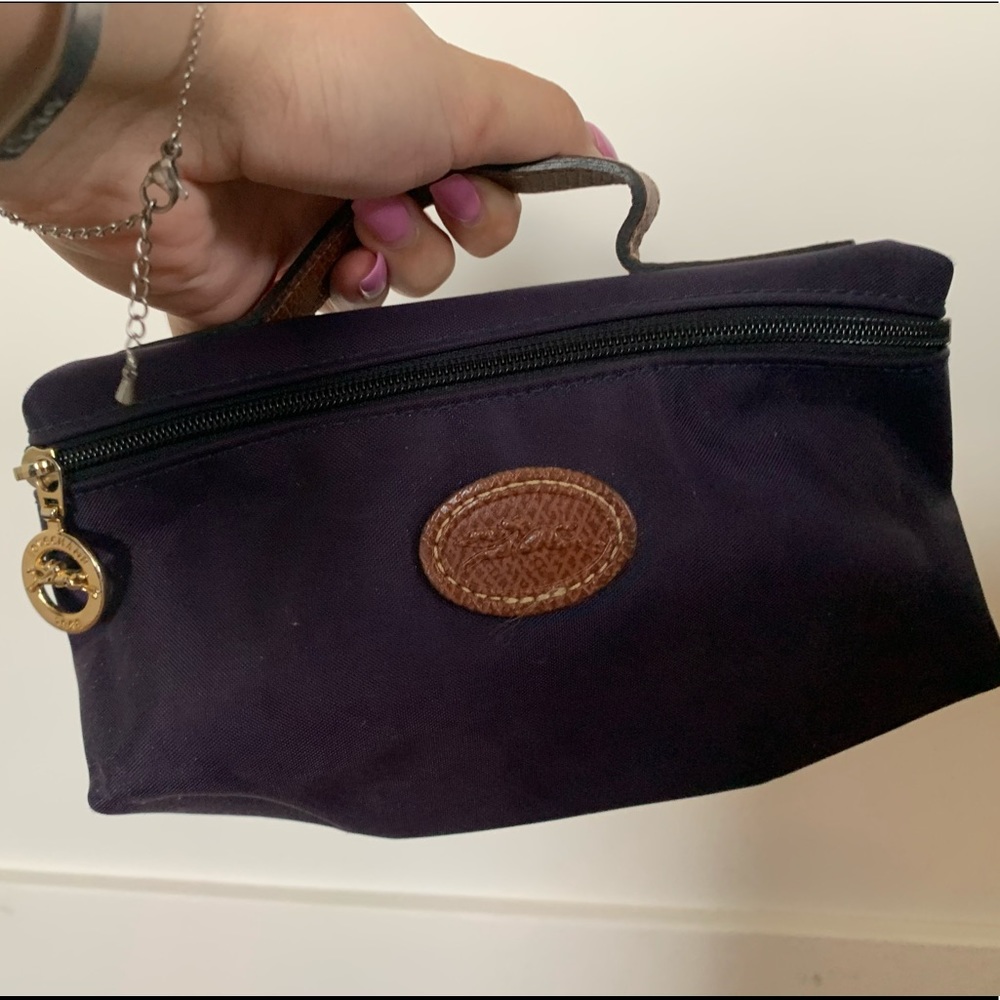 Longchamp plum cosmetic case